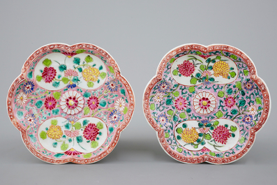 A pair of Chinese famille rose teapots on stand, Yongzheng/Qianlong, 18th C.